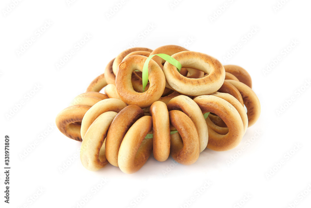 Small bagels or baranki isolated on white background. Bunch of sushki dry bread rolls.. Small bagels or baranki isolated on white background. Bunch of sushki dry bread rolls..