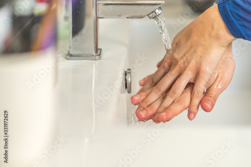 nurse shows how to properly wash your hands with soap to prevent coronavirus infections and prevent the spread of the world pandemic