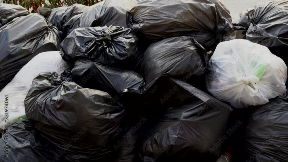 Garbage in the black bag in the waste pile - Not separating waste for Recycle concept - Footage 4K Garbage in the black bag in the waste pile - Not separating waste for Recycle concept - Footage 4K
