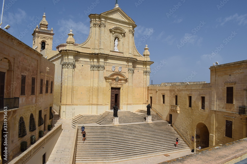 RABAT, MALTA - August 2018: Traditional Maltese church architecture, old houses and narrow streets, Rabat, Mdina, Malta