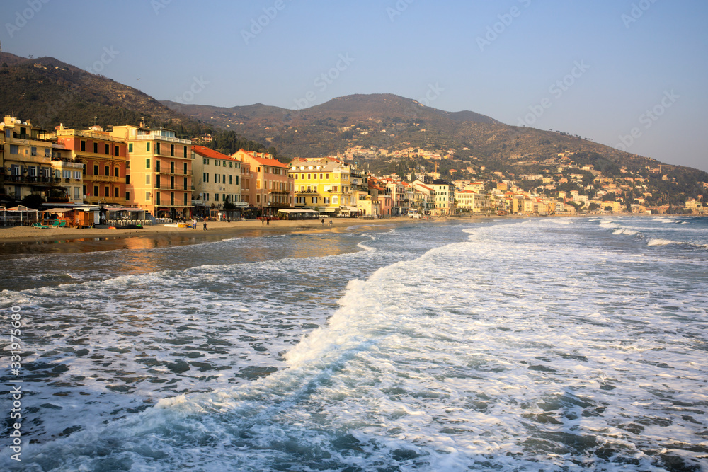 Obraz premium Alassio (SV), Italy - December 12, 2017: Alassio view's town from the pier, Riviera dei Fiori, Savona, Liguria, Italy
