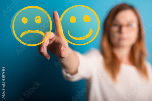 Hand is selecting a happy m...