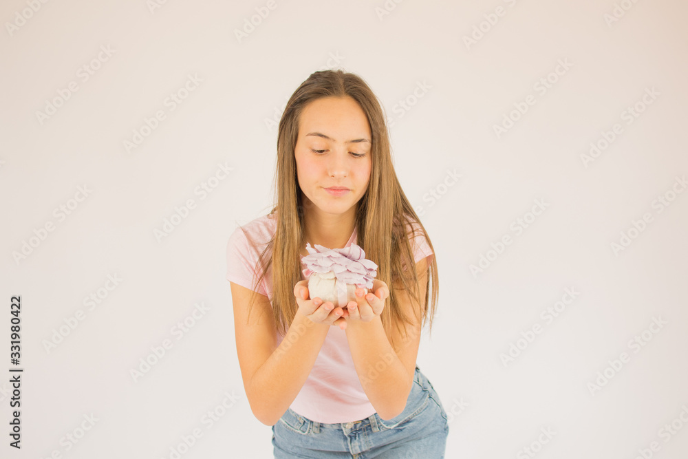 Beautiful girl with rose in her hand Beautiful girl with rose in her hand