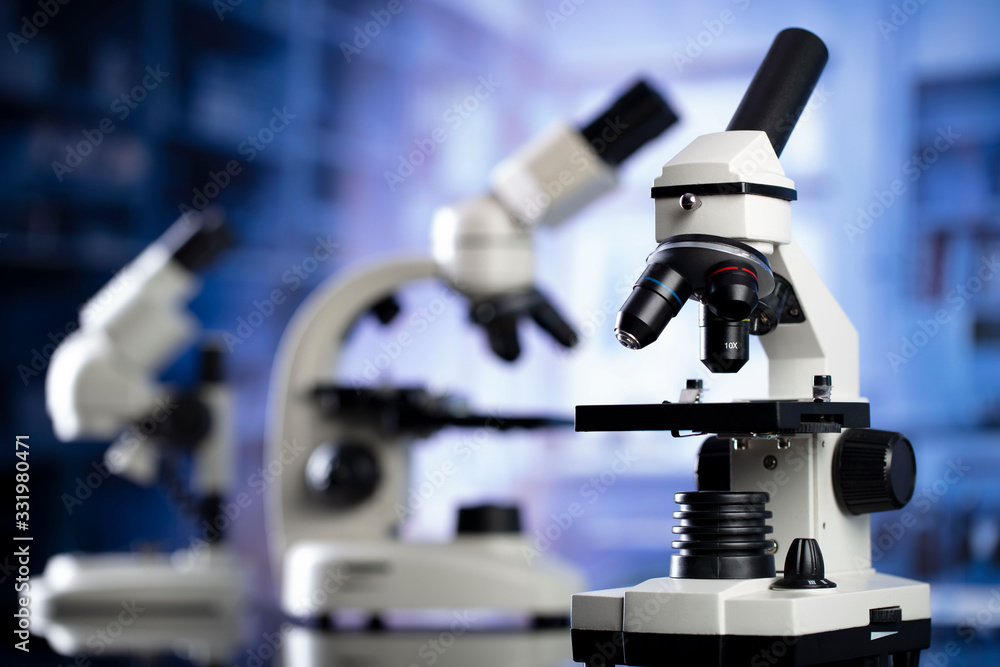 Modern scientific laboratory interior. Reaserch station with microscopes on the glass table. Modern scientific laboratory interior. Reaserch station with microscopes on the glass table.