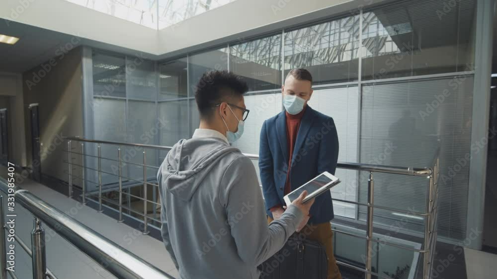 Coronavirus Covid-19 danger. Office workers with mask for corona virus Coronavirus Covid-19 danger. Office workers with mask for corona virus
