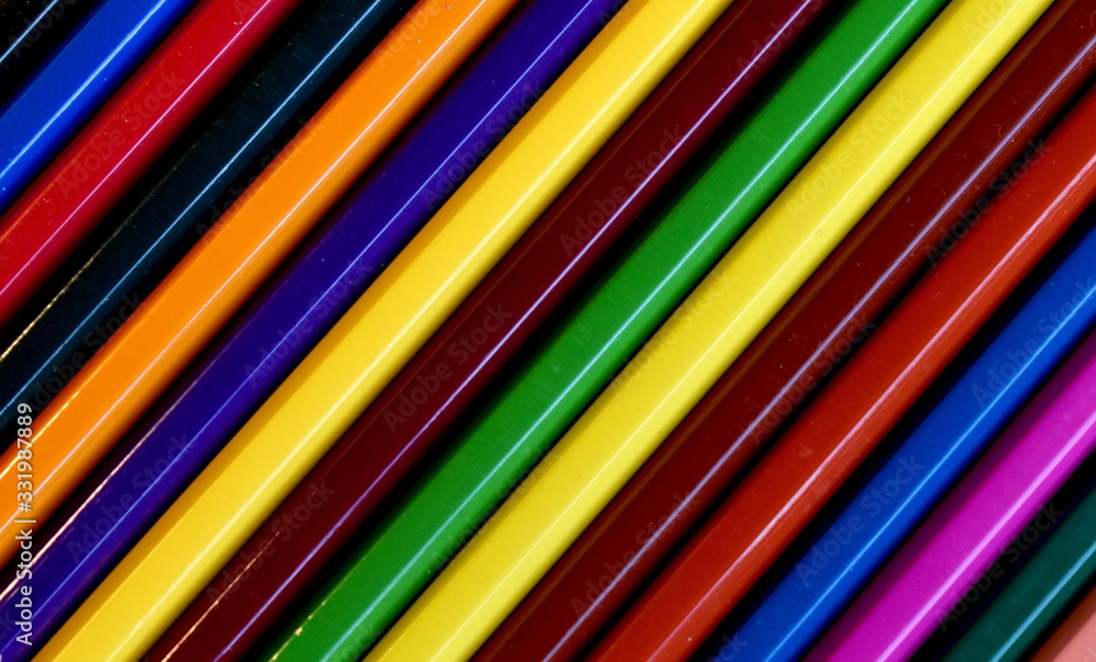 Bright background made of colored wooden pencils, are located on the diagonal. Bright background made of colored wooden pencils, are located on the diagonal.