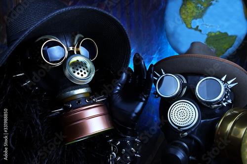 Gas mask and planet Earth. Virus, pollution and chemical protection concept.Selective focus, dark key image.