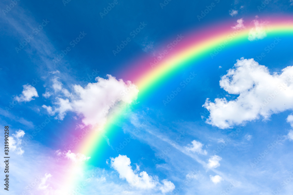 Blue sky and clouds with rainbow background