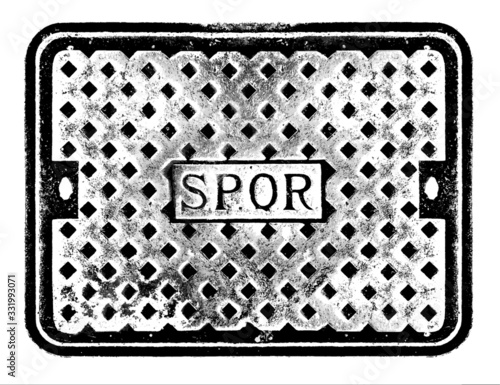 Rome, Italy - Characteristic iron manhole cover in the streets of the city of Rome, with the inscription SPQR (Senatus Populusque Romanus, "The Roman Senate and People"). Texture, pattern.