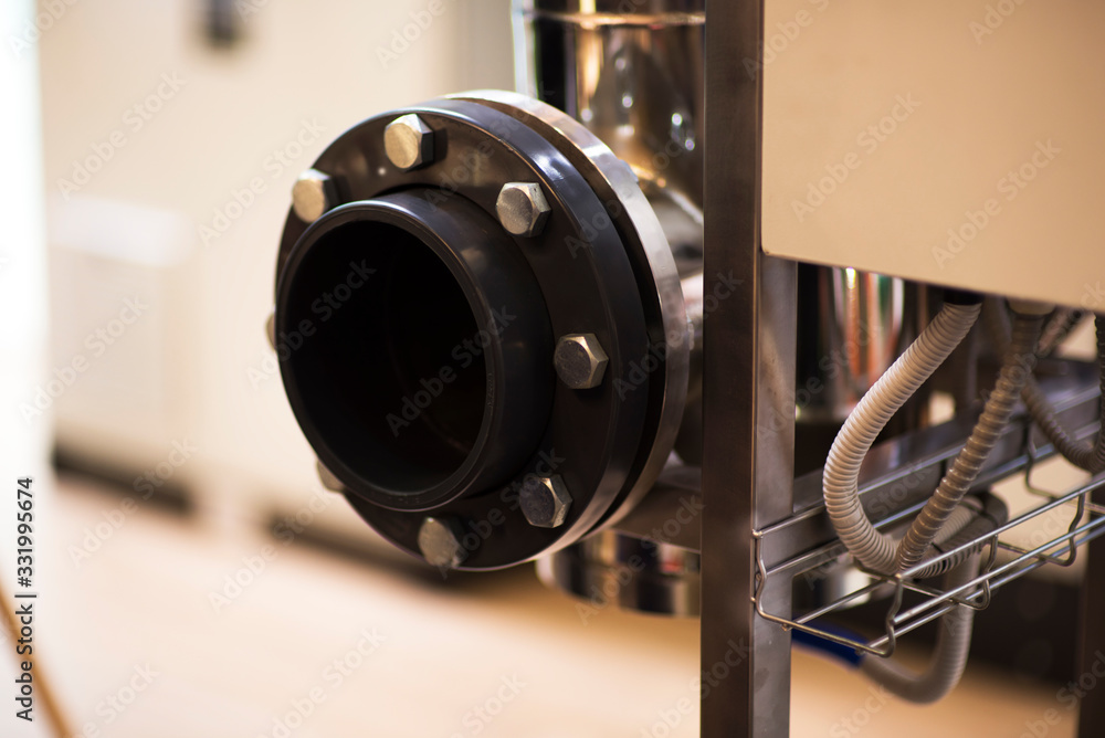 Fototapeta premium Flanges, nuts, bolts, tubes in industry concept
