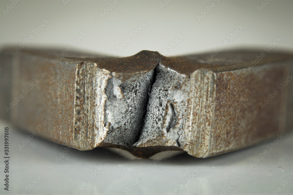 It is the low carbon steel that has been applied fracture test. Fracture test is applying to