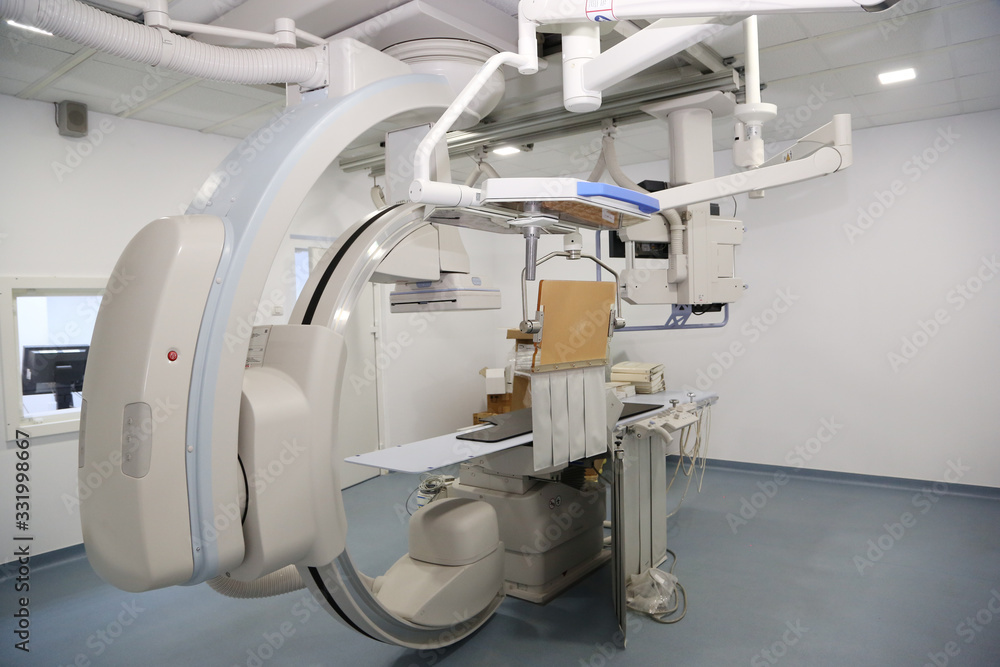 Angio lab in a hospital with diagnostic imaging equipment used to visualize the arteries and the chambers of the heart