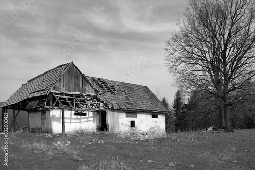 a ruined old house on the field