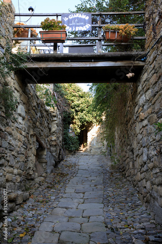 Bussana Vecchia (IM), Italy - December 12, 2017: A patway in Bussana Vecchia, Imperia, Liguria, Italy photo