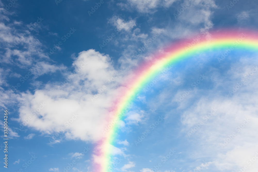 Blue sky and clouds with rainbow background
