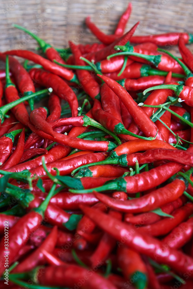 Red chilli in basket close up background Red chilli in basket close up background