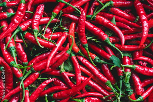 Red chilli in basket close up background