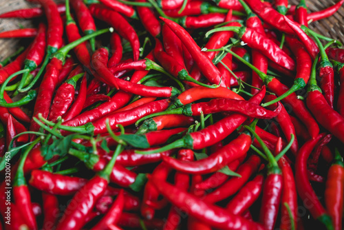 Red chilli in basket close up background