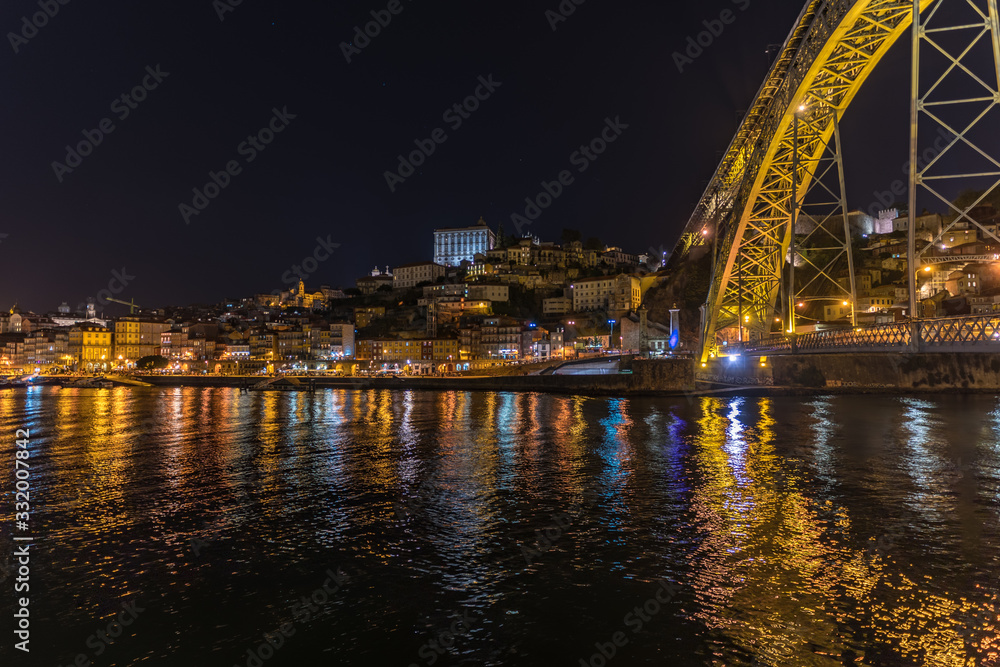 Night city skyline of Porto in Portugal with the Ponte Luis I bridge