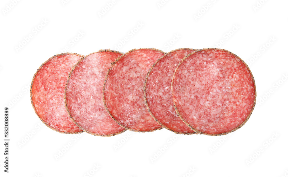 Slices of tasty sausage on white background, top view