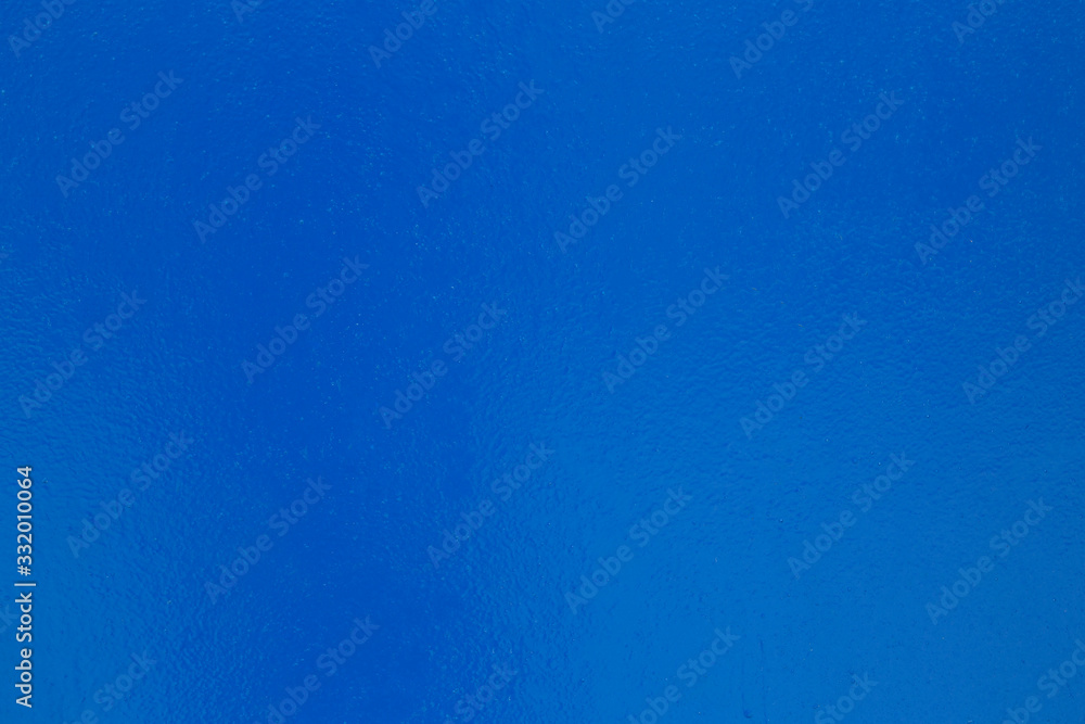 Blue background. Metal painted with blue paint. Blue background. Metal painted with blue paint.
