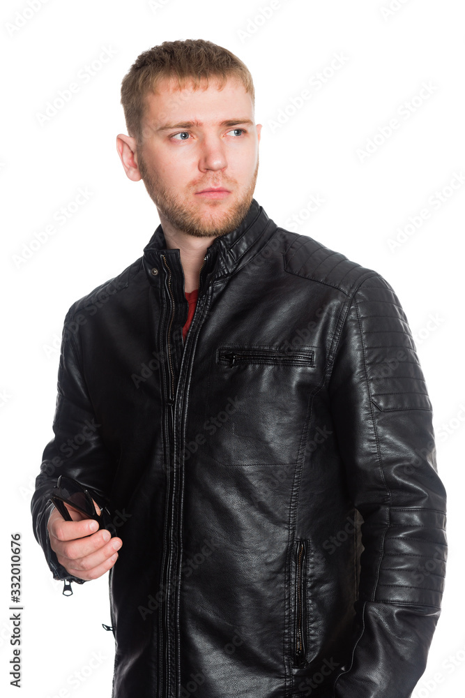 Young man with beard in black jacket Young man with beard in black jacket