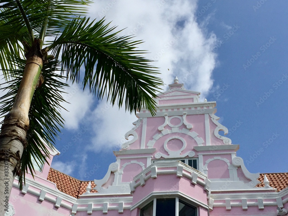 Typical  Dutch Architecture in pastel pink in Oranjestad Aruba