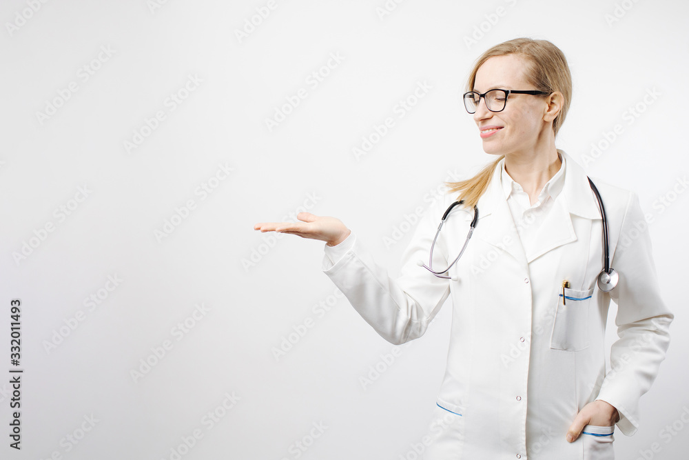 Portrait of happy medical expert in white lab coat and eyegasses surprised standing in studio with open palm, isolated on white background. Space for text, product or advertisement Portrait of happy medical expert in white lab coat and eyegasses surprised standing in studio with open palm, isolated on white background. Space for text, product or advertisement