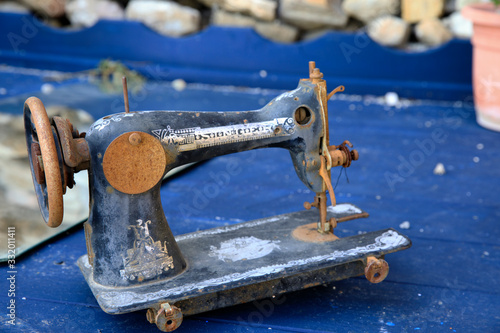 Bussana Vecchia (IM), Italy - December 12, 2017: An old sewing machine in Bussana Vecchia, Imperia, Liguria, Italy