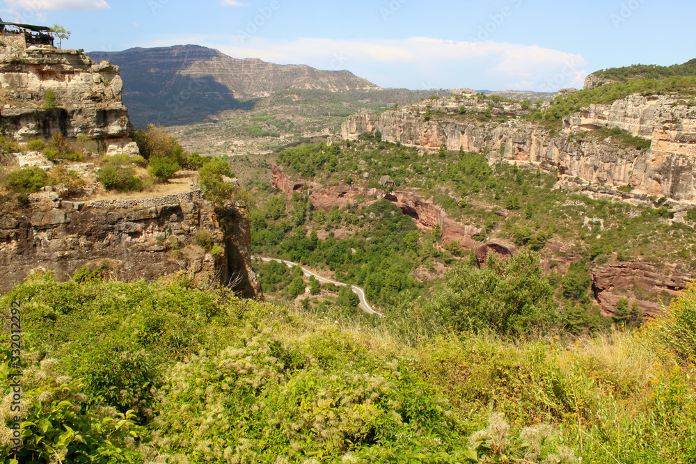 Panoramic landscape from a cliff at Siurana - a famous highland village Siurana of the municipality of the Cornudella de Montsant in the comarca of Priorat, Tarragona, Catalonia, Spain.