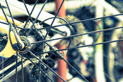 Bicycle wheel in vintage filter close up.