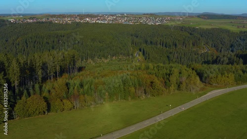 Aerial view of the City Bondorf in Germany. On a sunny day in Autumn, fall. Wide view with slow descend. photo