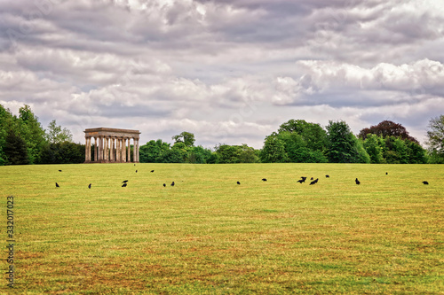 Temple of Concord and rooks in Park of Audley End photo