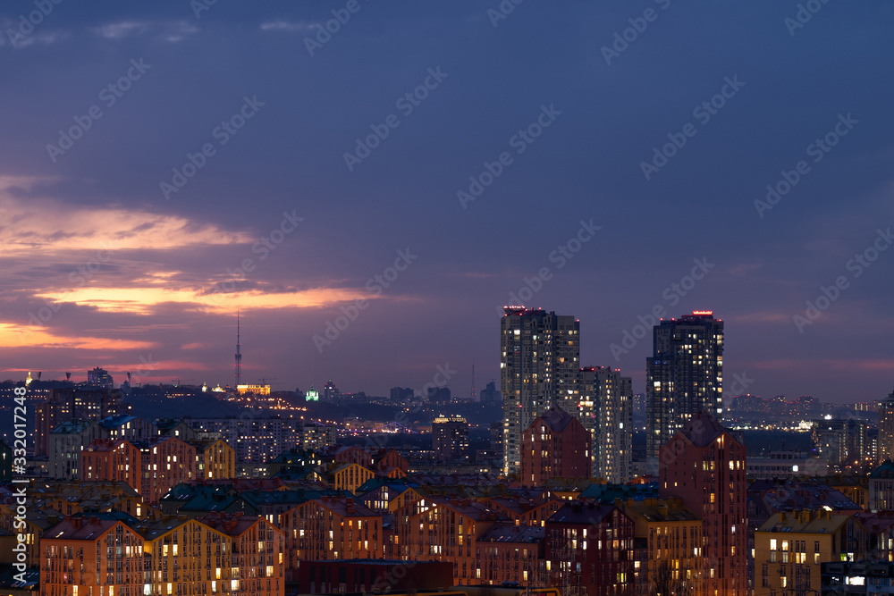 Aerial shot of colorful residential buildings during sunset. Real estate and housing in Kyiv, Ukraine. comfort town 