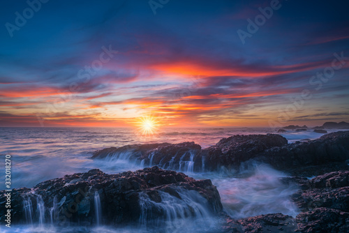 Oregon coast sunset and ocean waterfalls