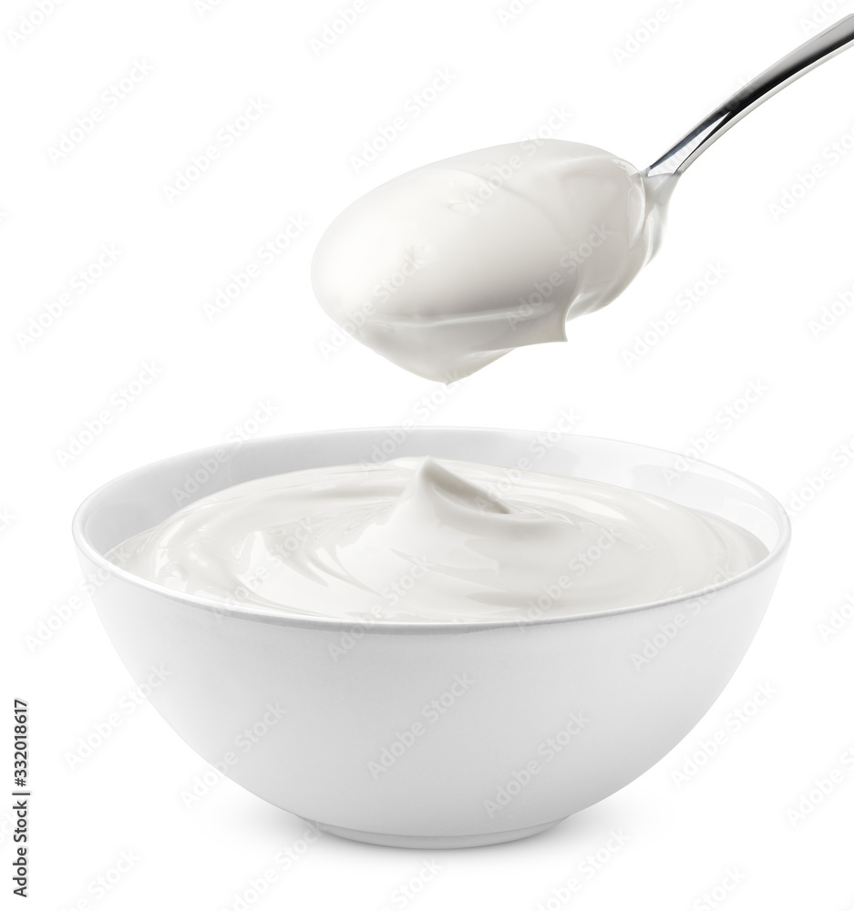 sour cream in bowl and spoon, mayonnaise, yogurt, isolated on white background, clipping path, full depth of field sour cream in bowl and spoon, mayonnaise, yogurt, isolated on white background, clipping path, full depth of field