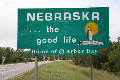 Quadro su tela Welcoming sign to Nebraska...The good life, Nebraska state line