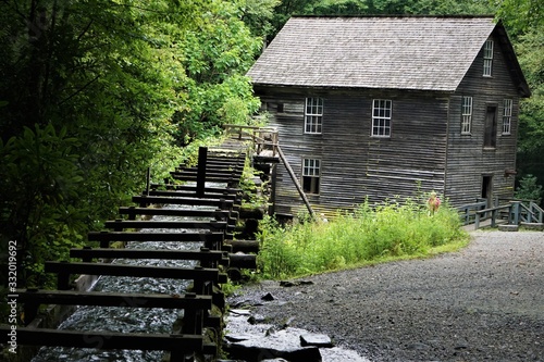  The old grist mill since 1886, still functional sluice,turbine and other machinery located in the Great Smoky Mountains National Park, NC USA.
