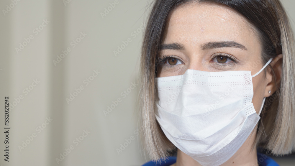 A young girl put on mask to protect from coronavirus, covid19. A young girl put on mask to protect from coronavirus, covid19.