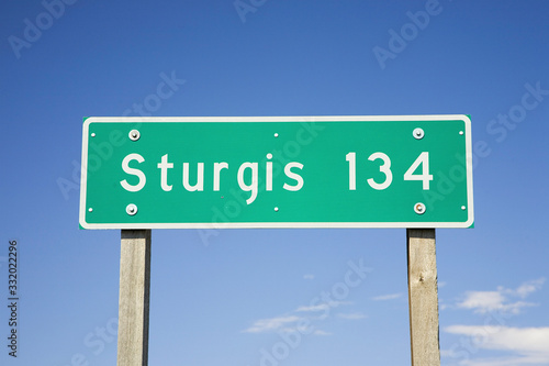 Highway sign reading Sturgis 134 miles on State Highway 34 heading towards the 67th Annual Sturgis Motorcycle Rally, Sturgis, South Dakota, August 6-12, 2007 © spiritofamerica
