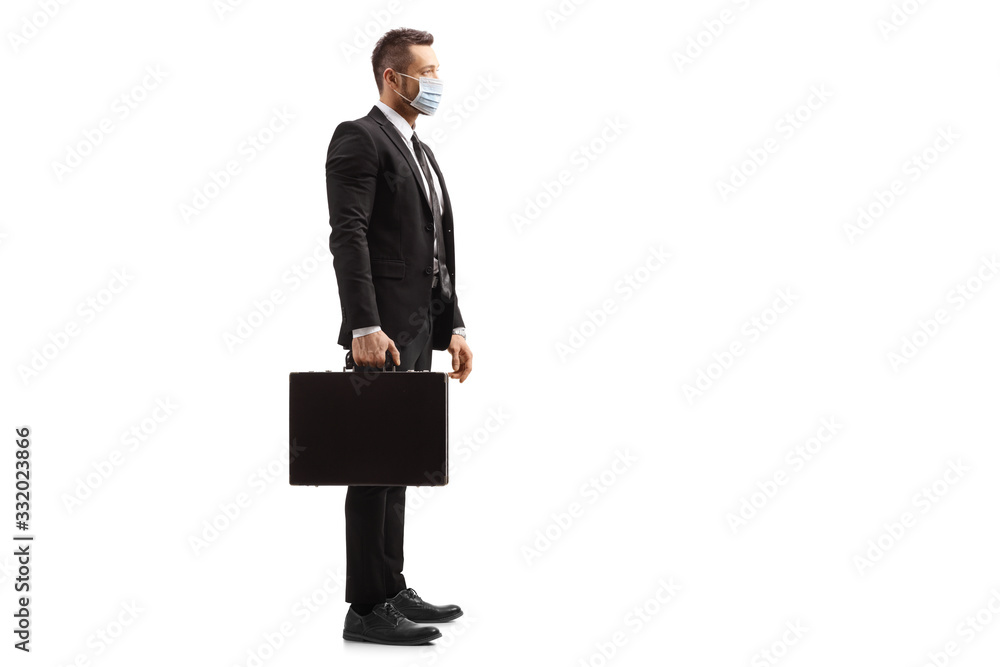 Businessman wearing a protective medical face mask Businessman wearing a protective medical face mask