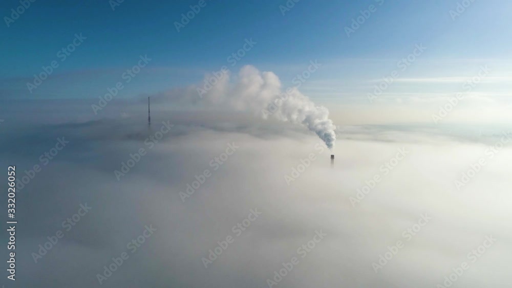 Aerial view. Emission to atmosphere from industrial pipes. Aerial view. Emission to atmosphere from industrial pipes.