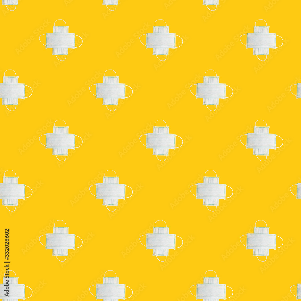 Pattern made of medical surgical masks on yellow background. Pattern made of medical surgical masks on yellow background.