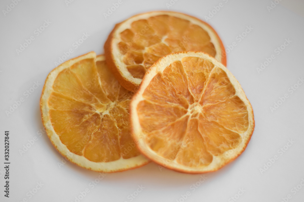 Slice of orange close up on white background Slice of orange close up on white background