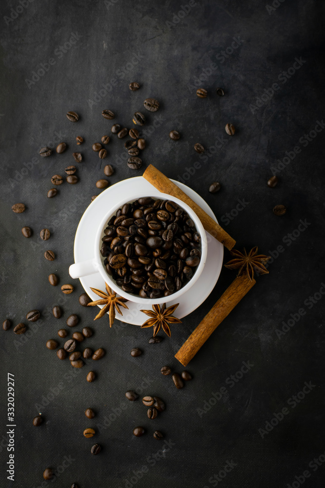 Coffee with beans on dark background Coffee with beans on dark background