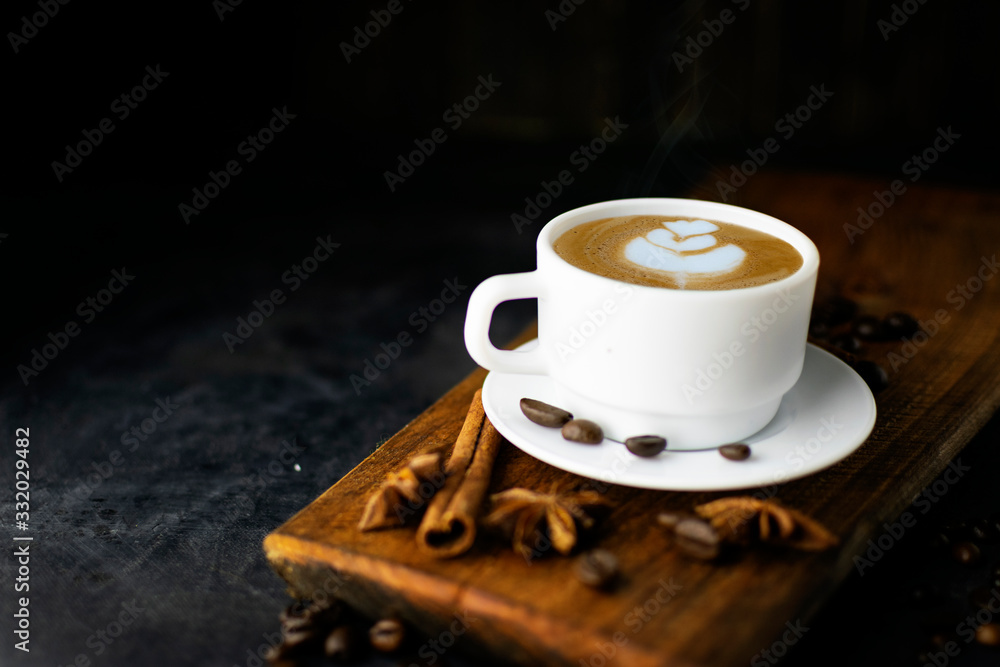 Coffee with beans on dark background Coffee with beans on dark background