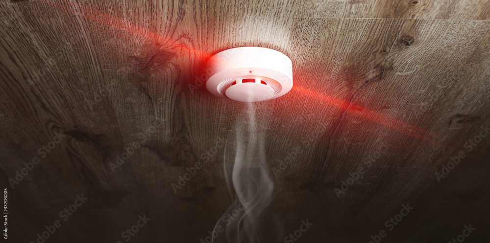 Φωτογραφία fire alarm sensor on a wooden