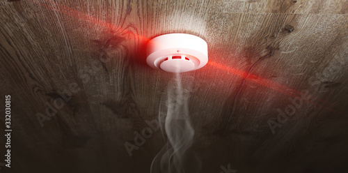 fire alarm sensor on a wooden