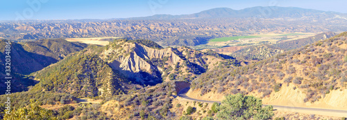 Panoramic look at Highway 33 overview of Cuyama Valley with Green Field in Southern California photo