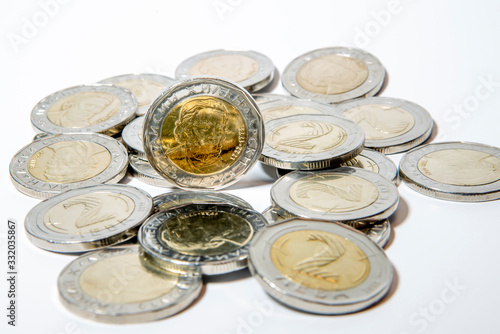 Pile of 2 BGN (Bulgarian lev) coins. St Paisii Hilendarski on the back.